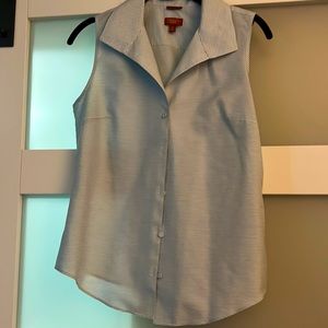 This is a light blue and white striped button down Talbots blouse like new